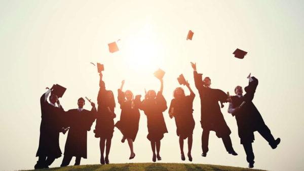 Grads throwing caps in the air